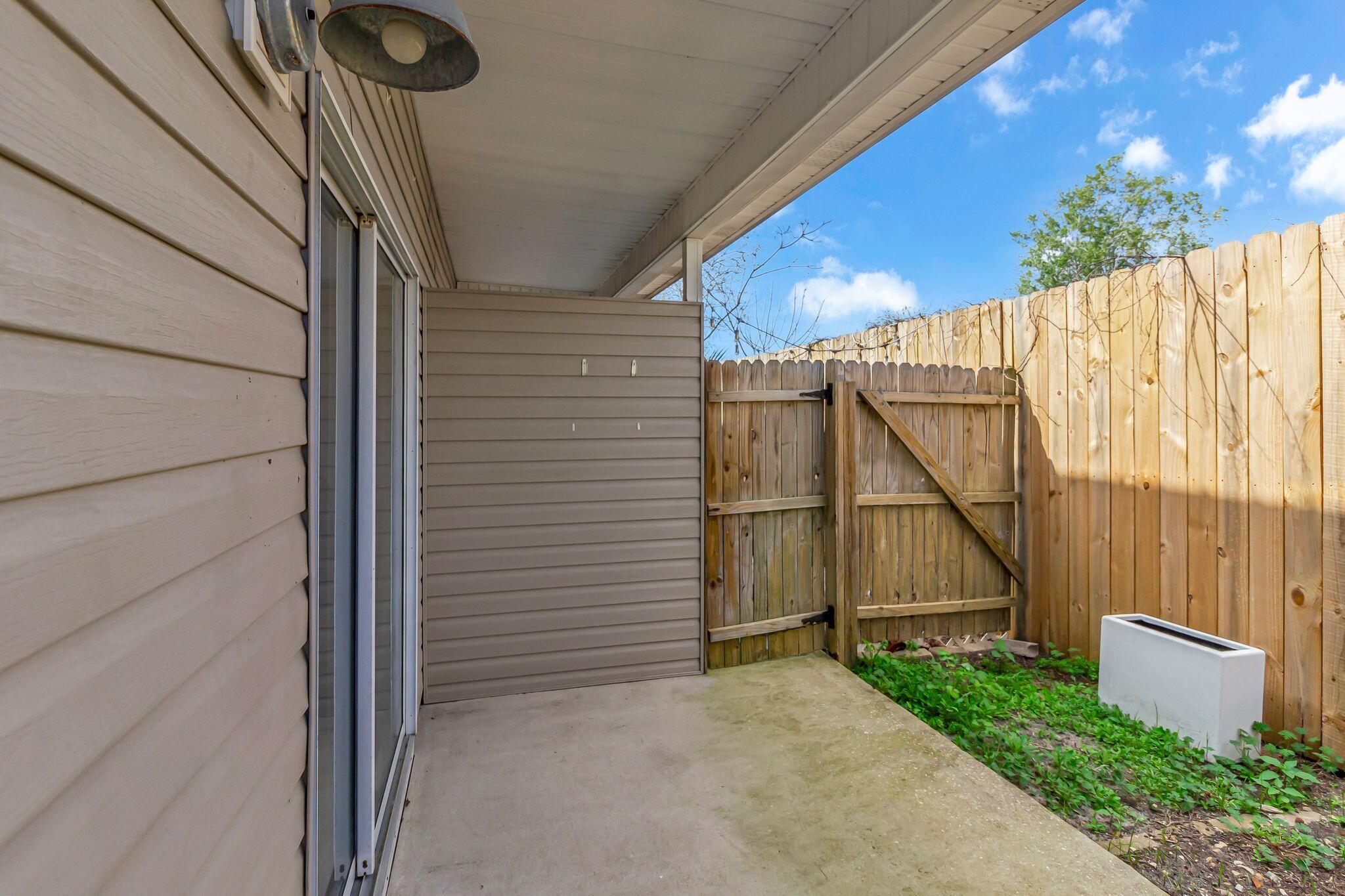 150 Bent Arrow Drive, Unit 51 Destin, FL 32541 - Photo 27 of 28 a view of a house with a backyard