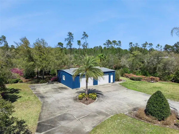 an aerial view of house with outdoor space