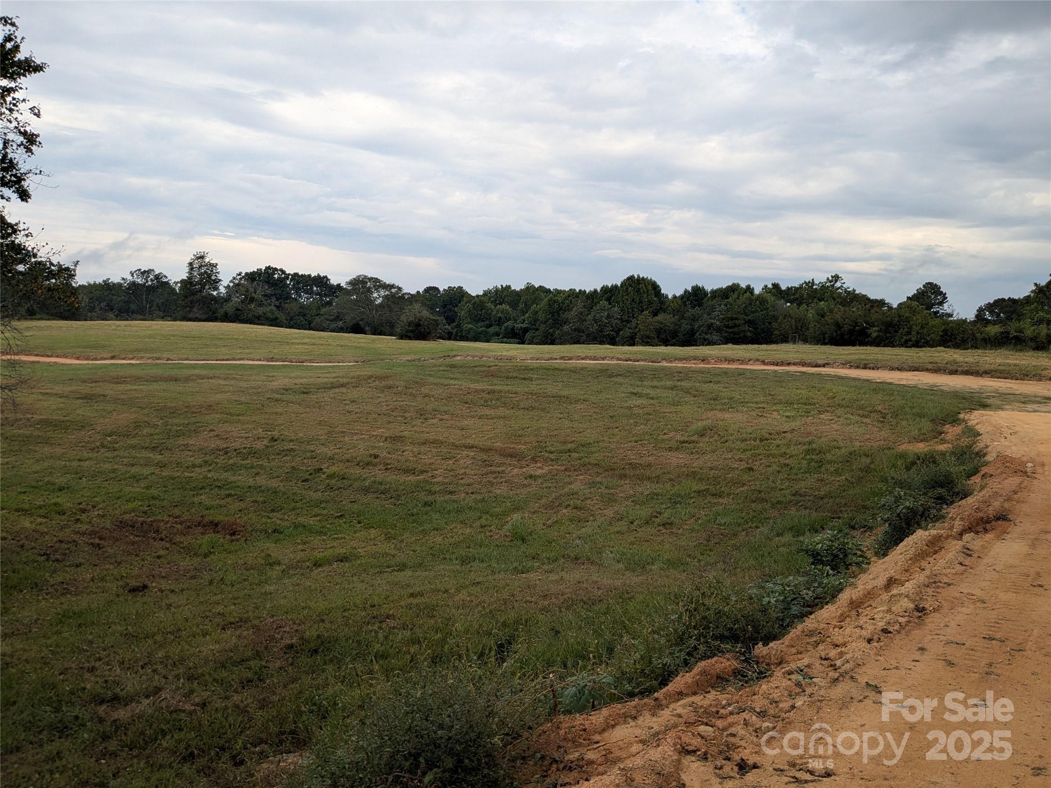 1227 Lavender Road Grover, NC 28073 - Photo 14 of 18 a view of a lake from a yard