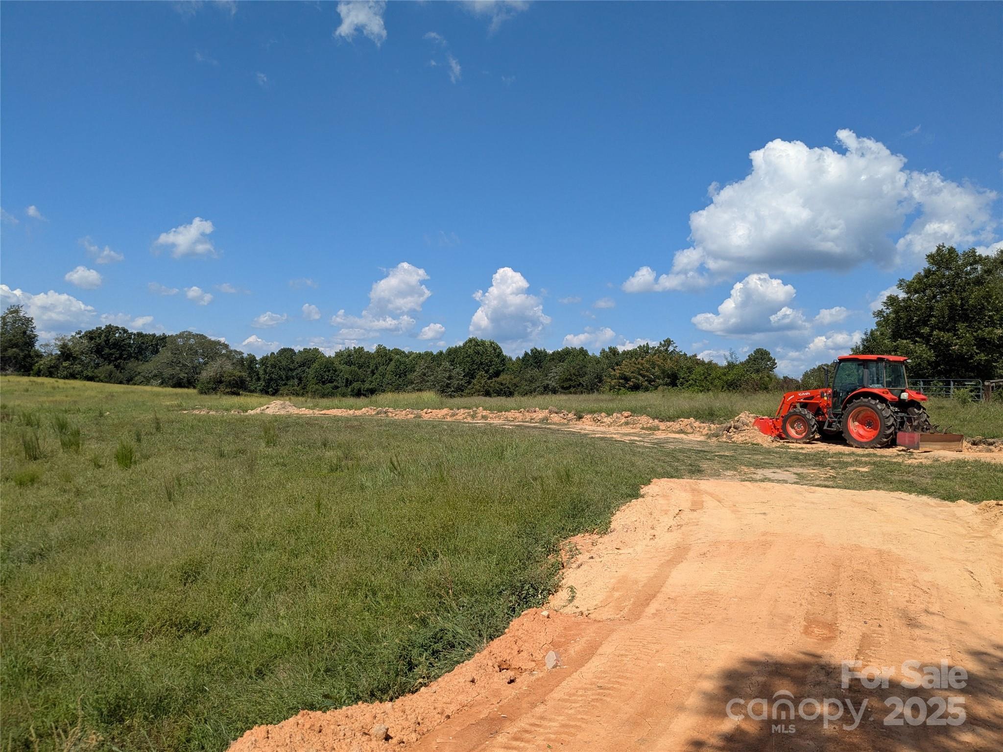 1227 Lavender Road Grover, NC 28073 - Photo 10 of 18 a view of a lake with houses in the back