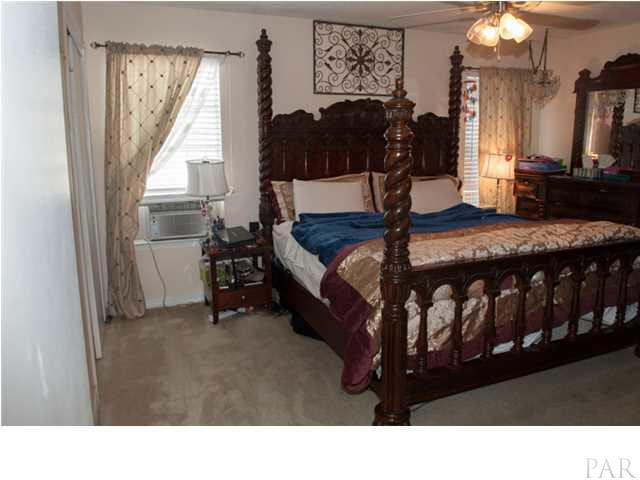 479 Sandy Ridge Circle Mary Esther, FL 32569 - Photo 9 of 14 Large Master bedroom is located downstairs.