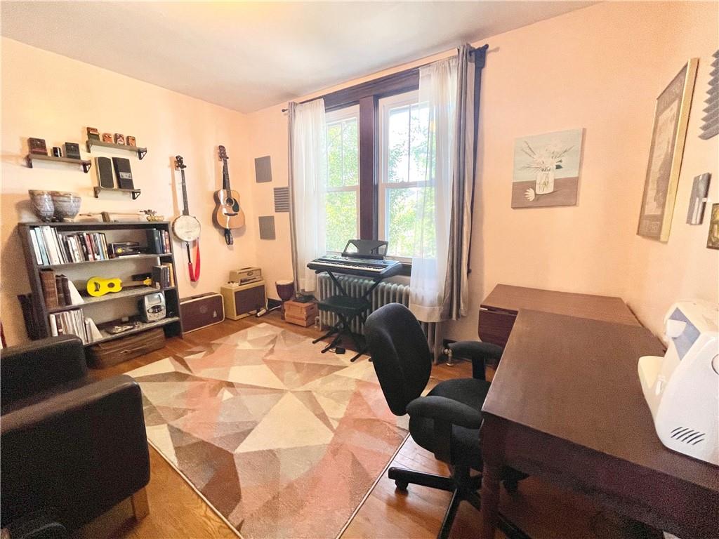 48 Perry View Avenue Pittsburgh, PA 15214 - Photo 16 of 24 a room with furniture and a large window