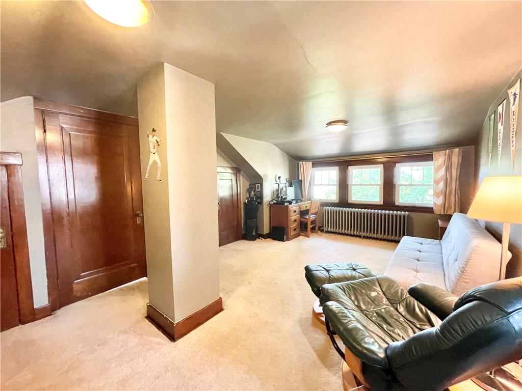48 Perry View Avenue Pittsburgh, PA 15214 - Photo 19 of 24 a living room with furniture and a large window