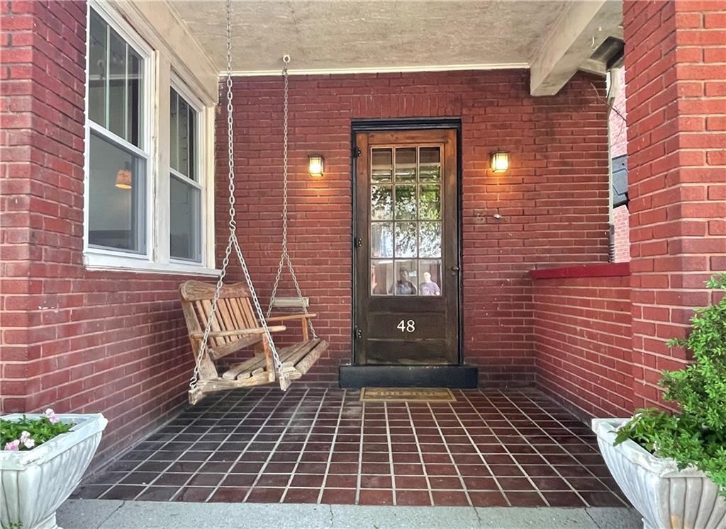 48 Perry View Avenue Pittsburgh, PA 15214 - Photo 2 of 24 a view of a backyard with sitting area