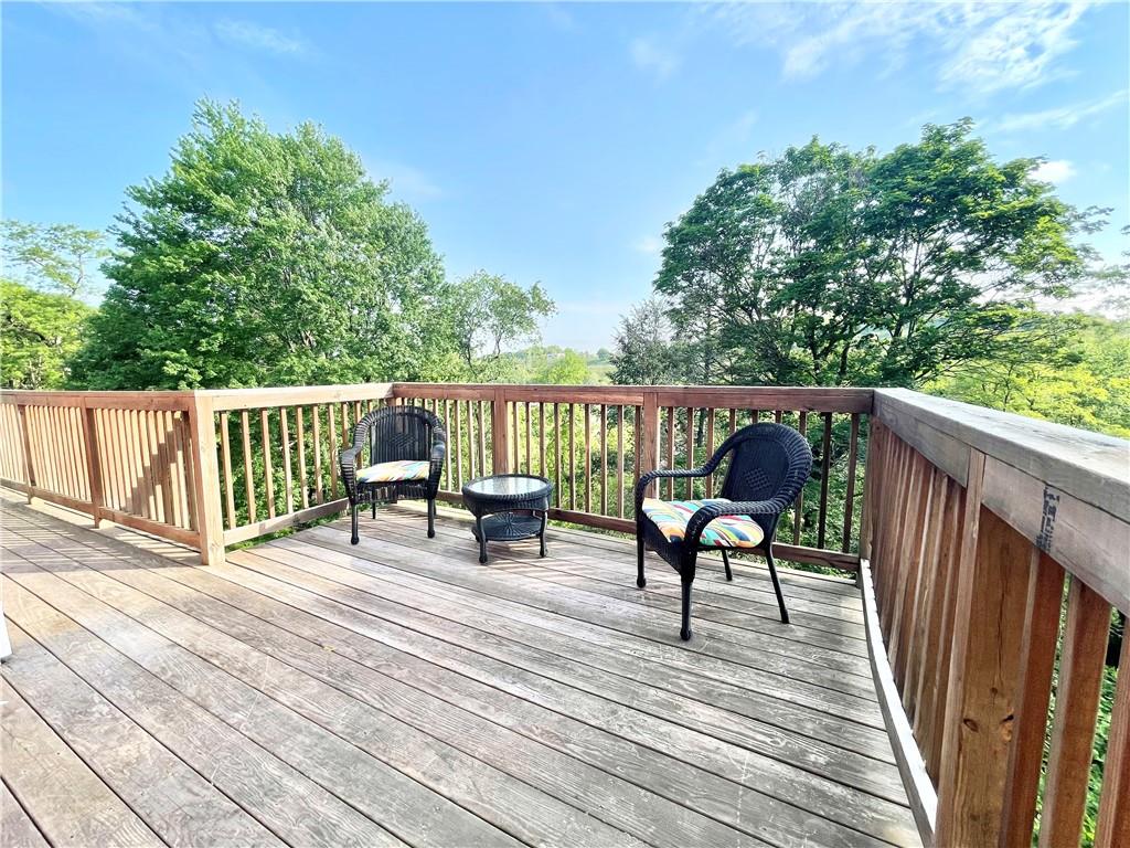 48 Perry View Avenue Pittsburgh, PA 15214 - Photo 23 of 24 a view of wooden deck with a table and chairs