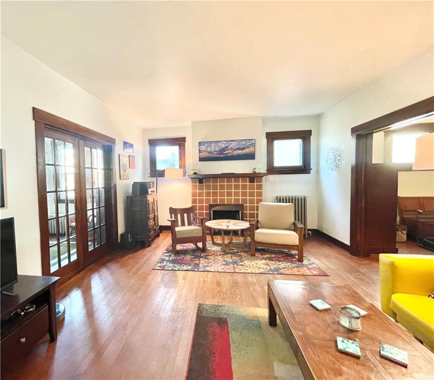 48 Perry View Avenue Pittsburgh, PA 15214 - Photo 5 of 24 a living room with furniture and a floor to ceiling window