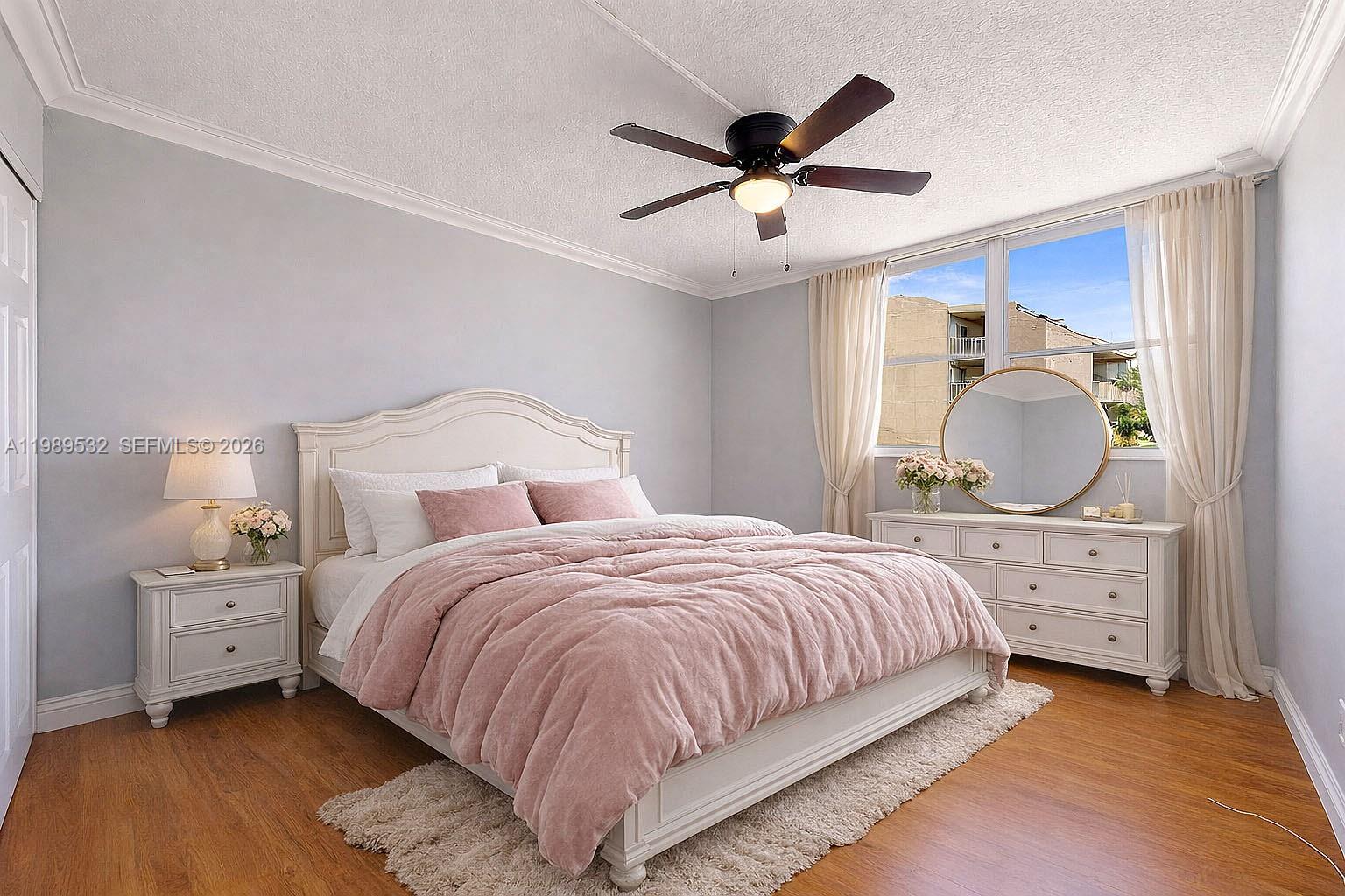 3581 Southwest 117th Avenue, Unit 5308 Miami, FL 33165 - Photo 27 of 38 a bedroom with a bed and a dresser