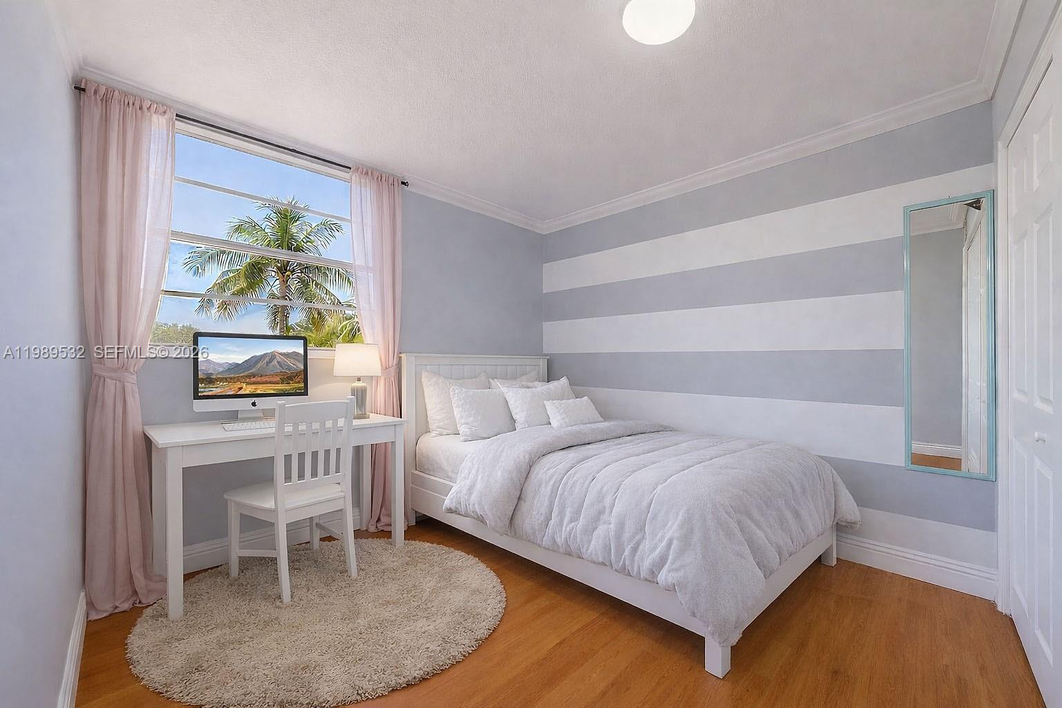 3581 Southwest 117th Avenue, Unit 5308 Miami, FL 33165 - Photo 31 of 38 a bedroom with a bed and a window