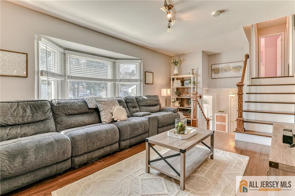 35 Outcalt Road Edison, NJ 08817 - Photo 11 of 33 a living room with furniture and a window