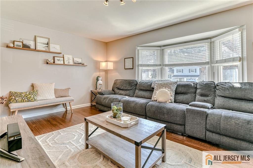 35 Outcalt Road Edison, NJ 08817 - Photo 12 of 33 a living room with furniture a rug and a window