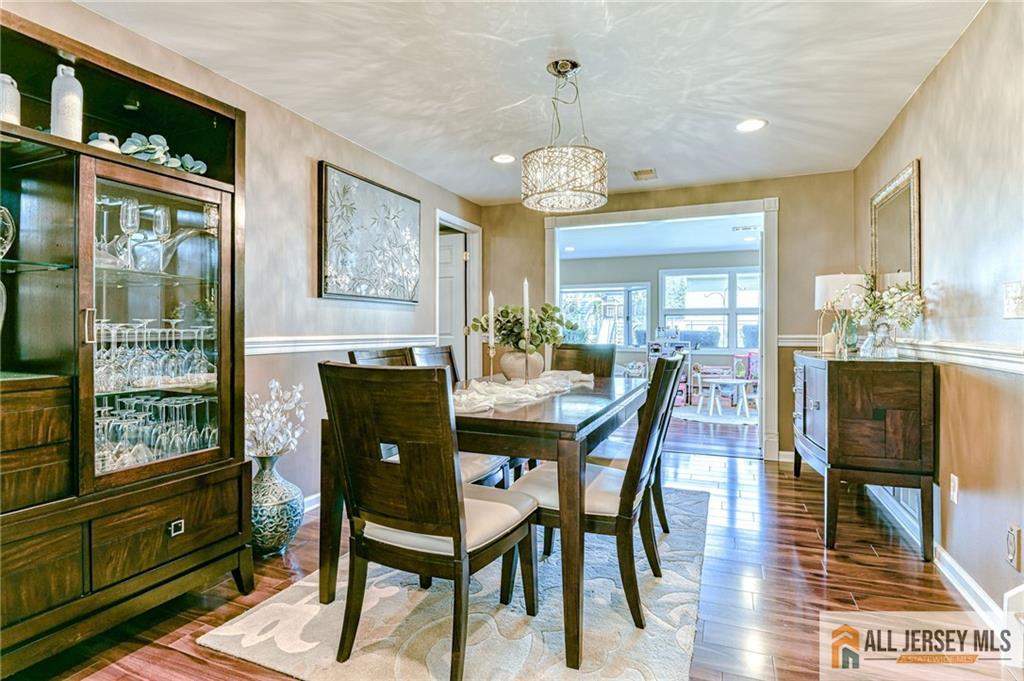35 Outcalt Road Edison, NJ 08817 - Photo 14 of 33 a view of a dining room with furniture window and wooden floor