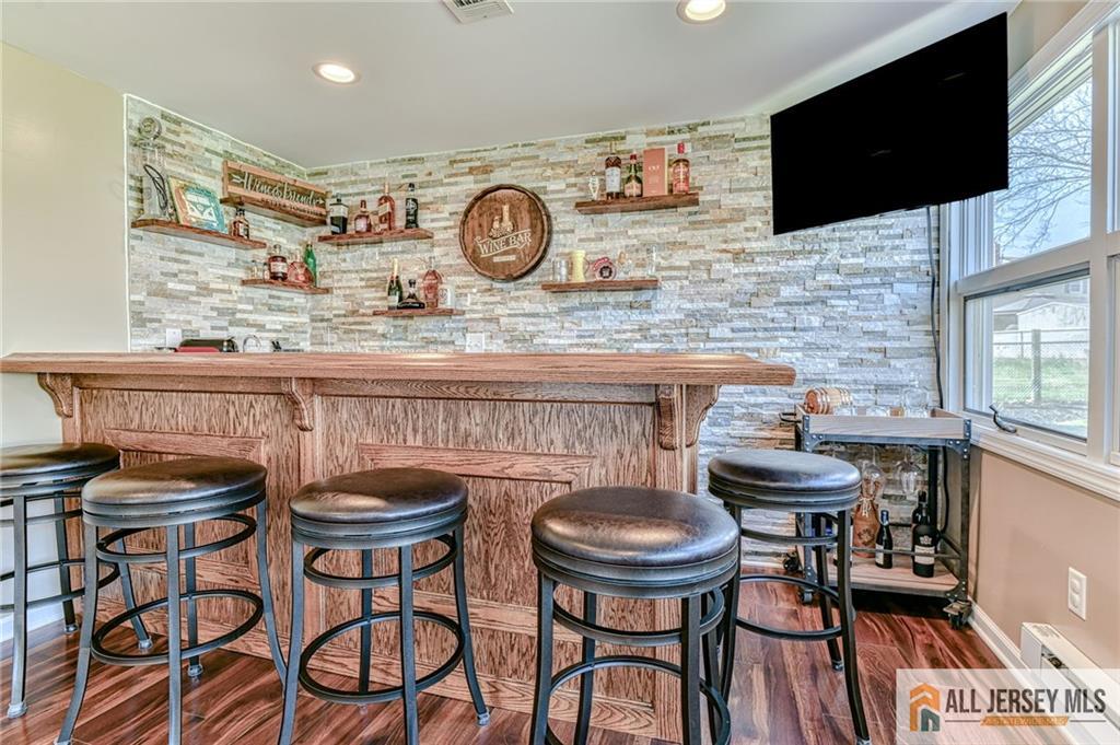 35 Outcalt Road Edison, NJ 08817 - Photo 18 of 33 a kitchen with a table and chairs in it