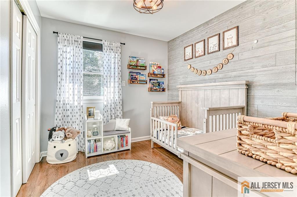 35 Outcalt Road Edison, NJ 08817 - Photo 24 of 33 a bedroom with furniture and a window