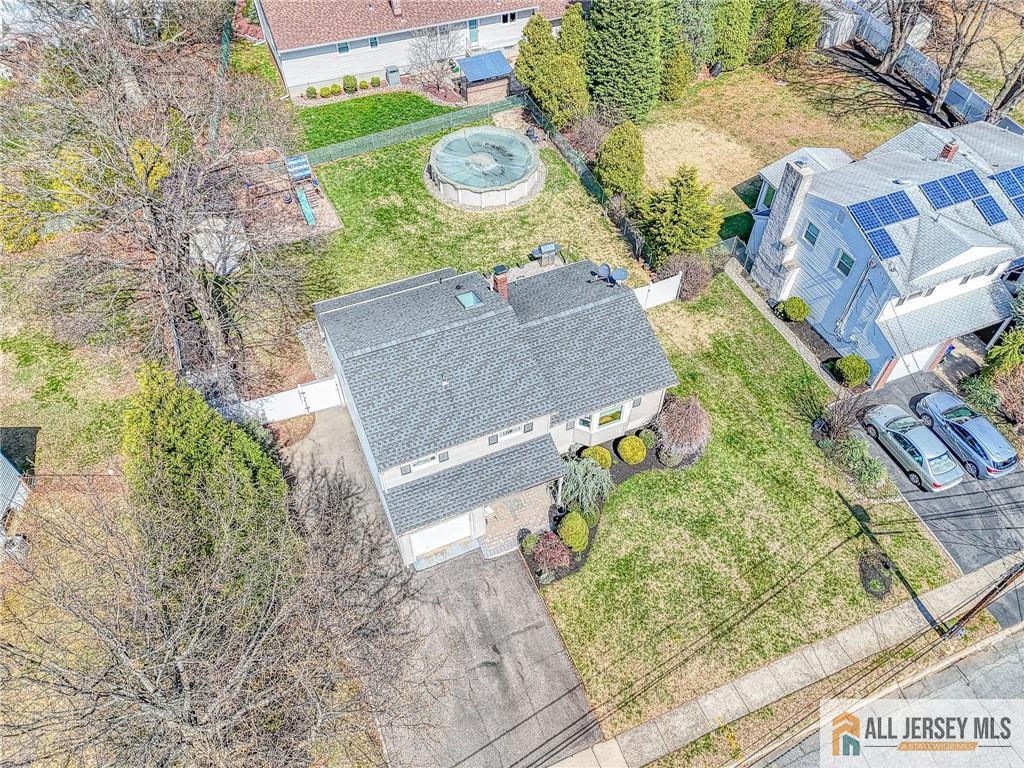 35 Outcalt Road Edison, NJ 08817 - Photo 28 of 33 an aerial view of a house with a yard basket ball court