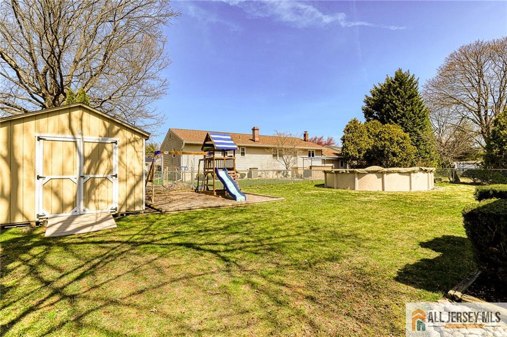 35 Outcalt Road Edison, NJ 08817 - Photo 33 of 33 a view of a yard with an outdoor space