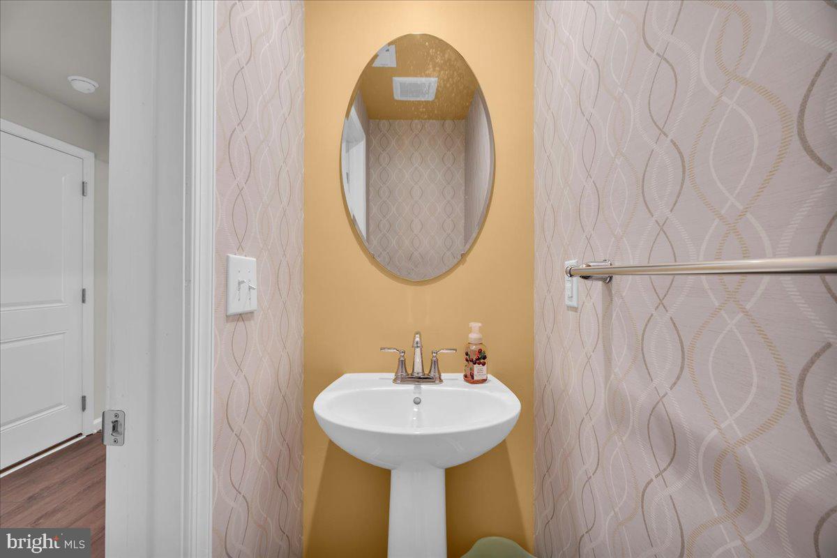 204 Freedom Way Sicklerville, NJ 08081 - Photo 5 of 32 Chic half-bath with modern flair.