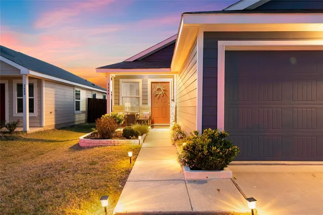 a front view of a house having yard