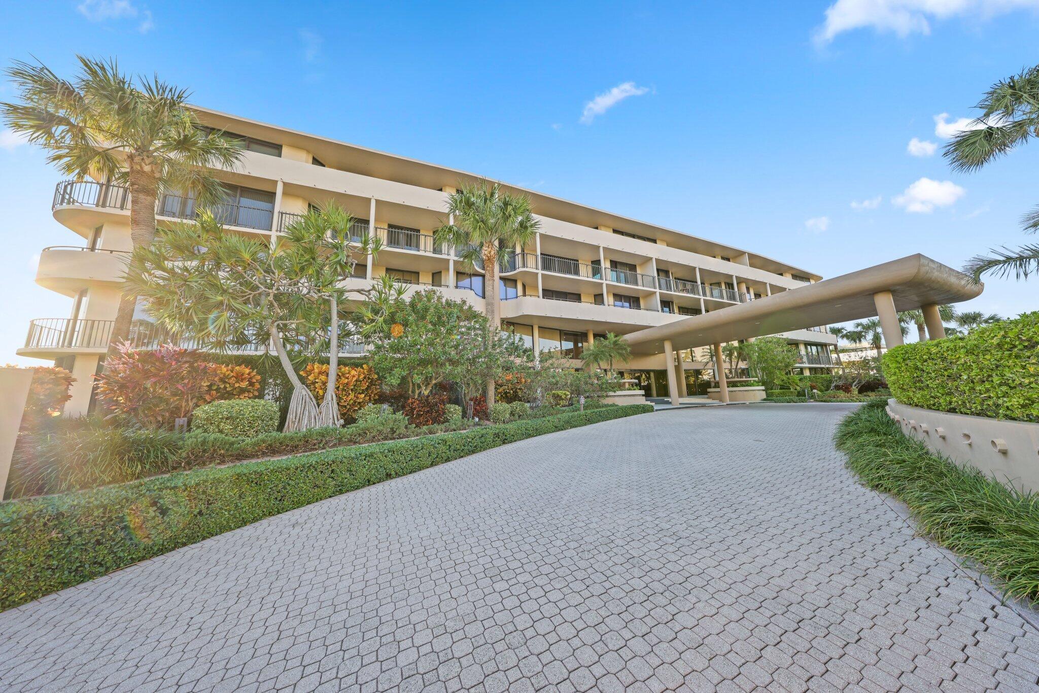 1401 South Ocean Boulevard, Unit 3090 Boca Raton, FL 33432 - Photo 24 of 46 a view of a big building with a big yard and large trees