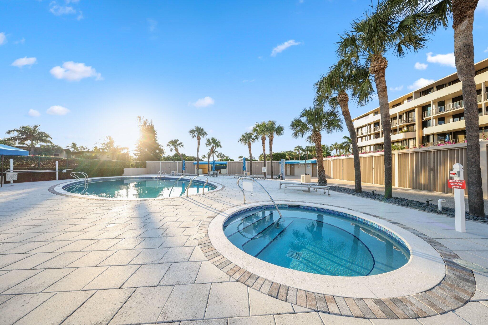 1401 South Ocean Boulevard, Unit 3090 Boca Raton, FL 33432 - Photo 34 of 46 a view of a swimming pool with a patio
