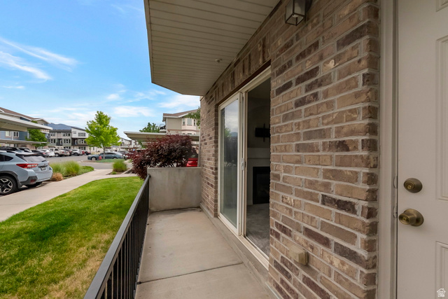 117 Calbourne Lane, Unit I2 Sandy, UT 84070 - Photo 15 of 19 Patio and Storage Shed/closet