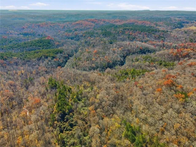 an aerial view of residential house and outdoor space