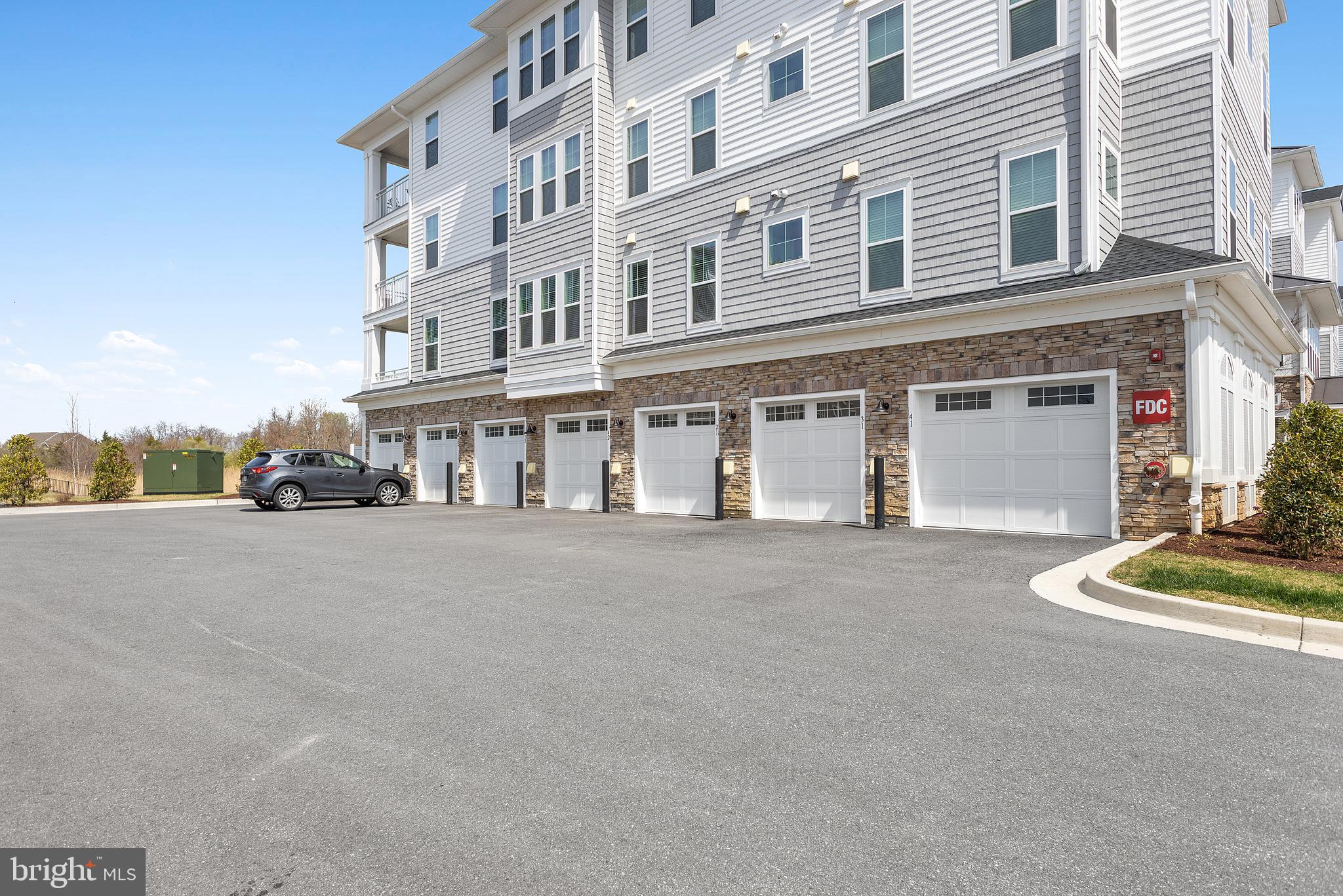 111 Marshgrass Way, Unit 43 Chester, MD 21619 - Photo 43 of 63 Building garage