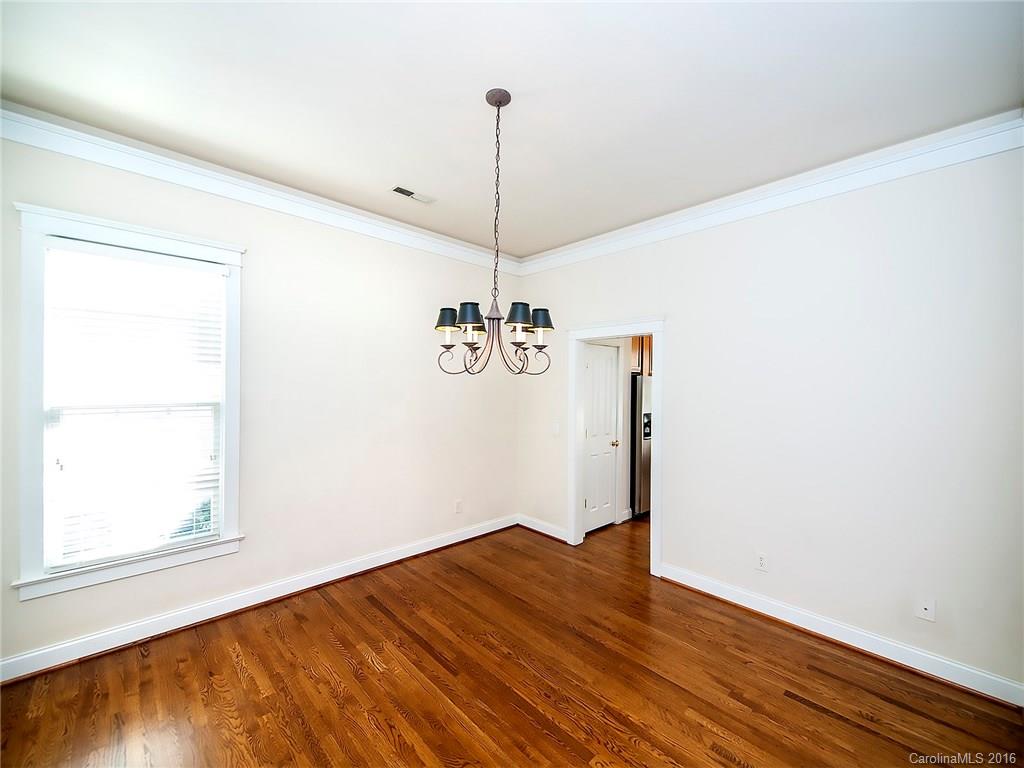 3221 Colonel Springs Way Fort Mill, SC 29708 - Photo 8 of 15 a view of a room with wooden floor closet and a ceiling fan