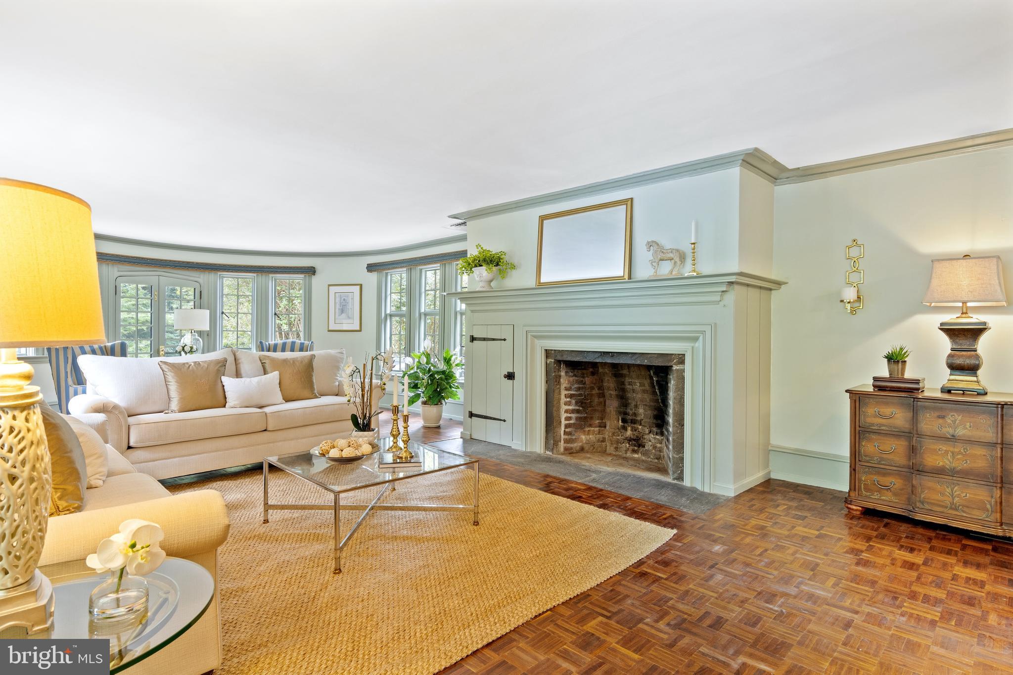 348 Louella Avenue Wayne, PA 19087 - Photo 9 of 48 Formal living room with wood burning fireplace