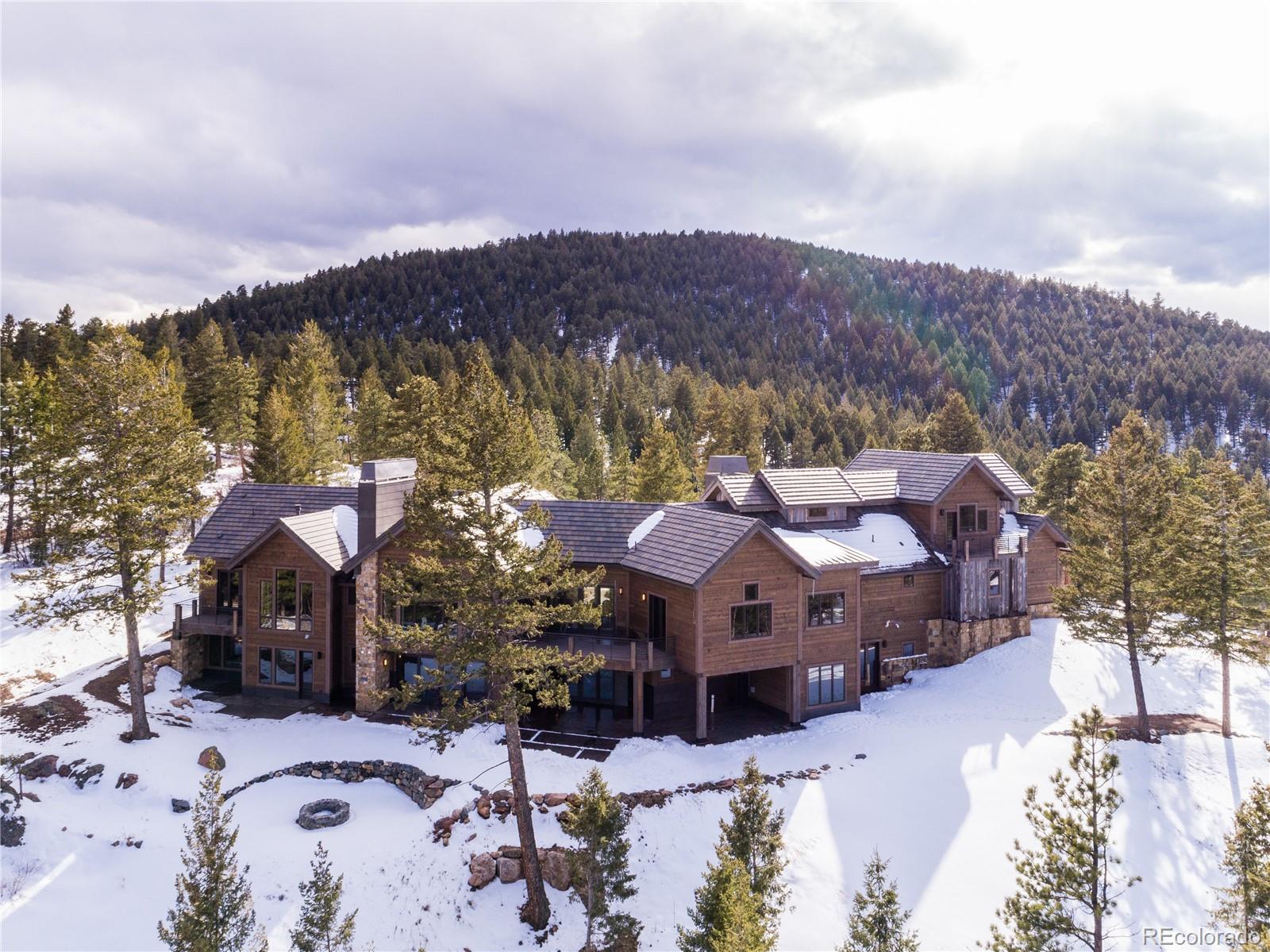 a aerial view of houses with a yard