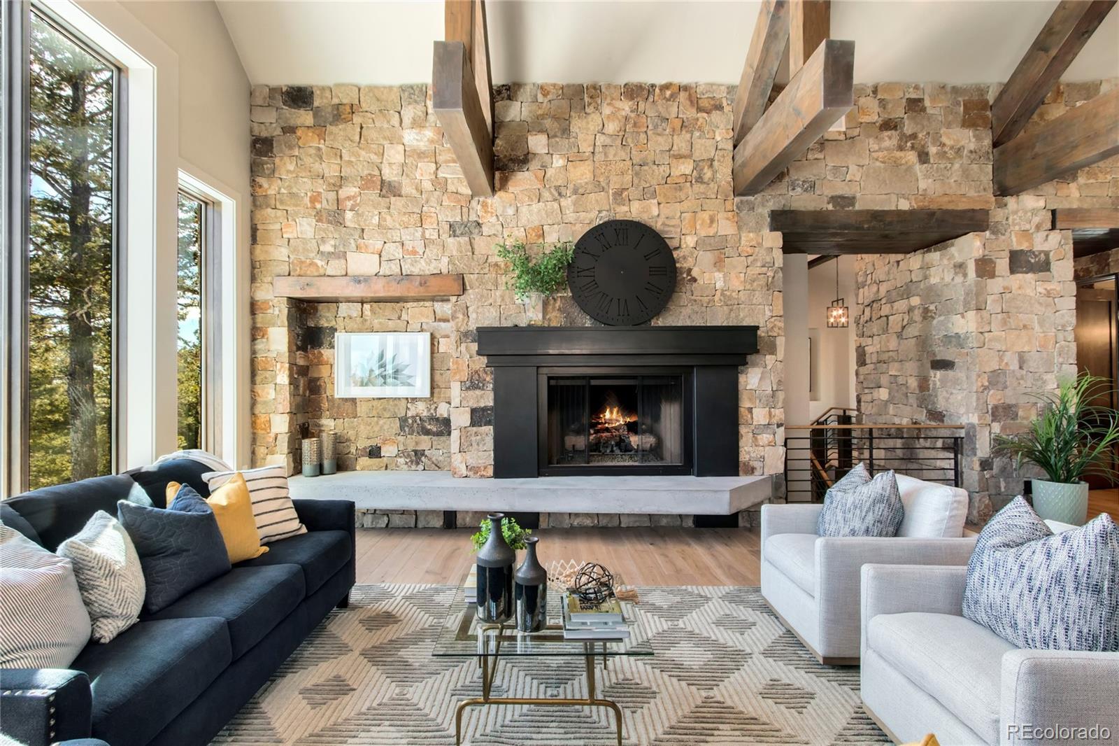6135 Northway Drive Morrison, CO 80465 - Photo 11 of 40 a living room with furniture and a fireplace