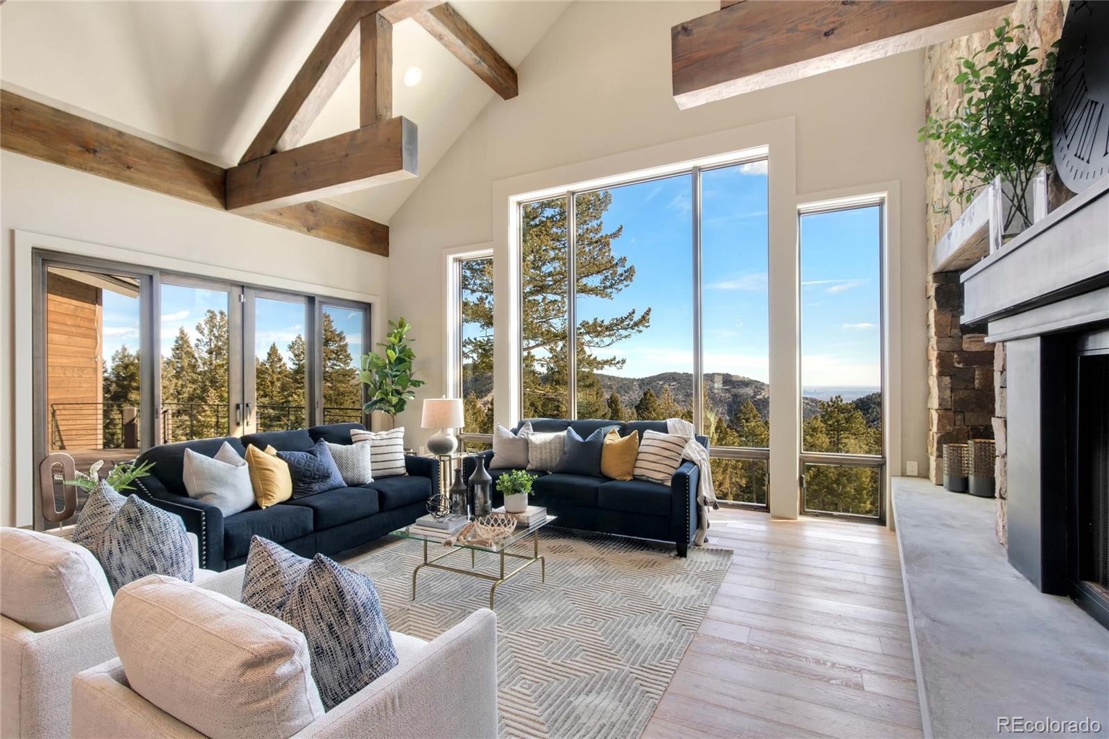 6135 Northway Drive Morrison, CO 80465 - Photo 12 of 40 a living room with furniture and a large window