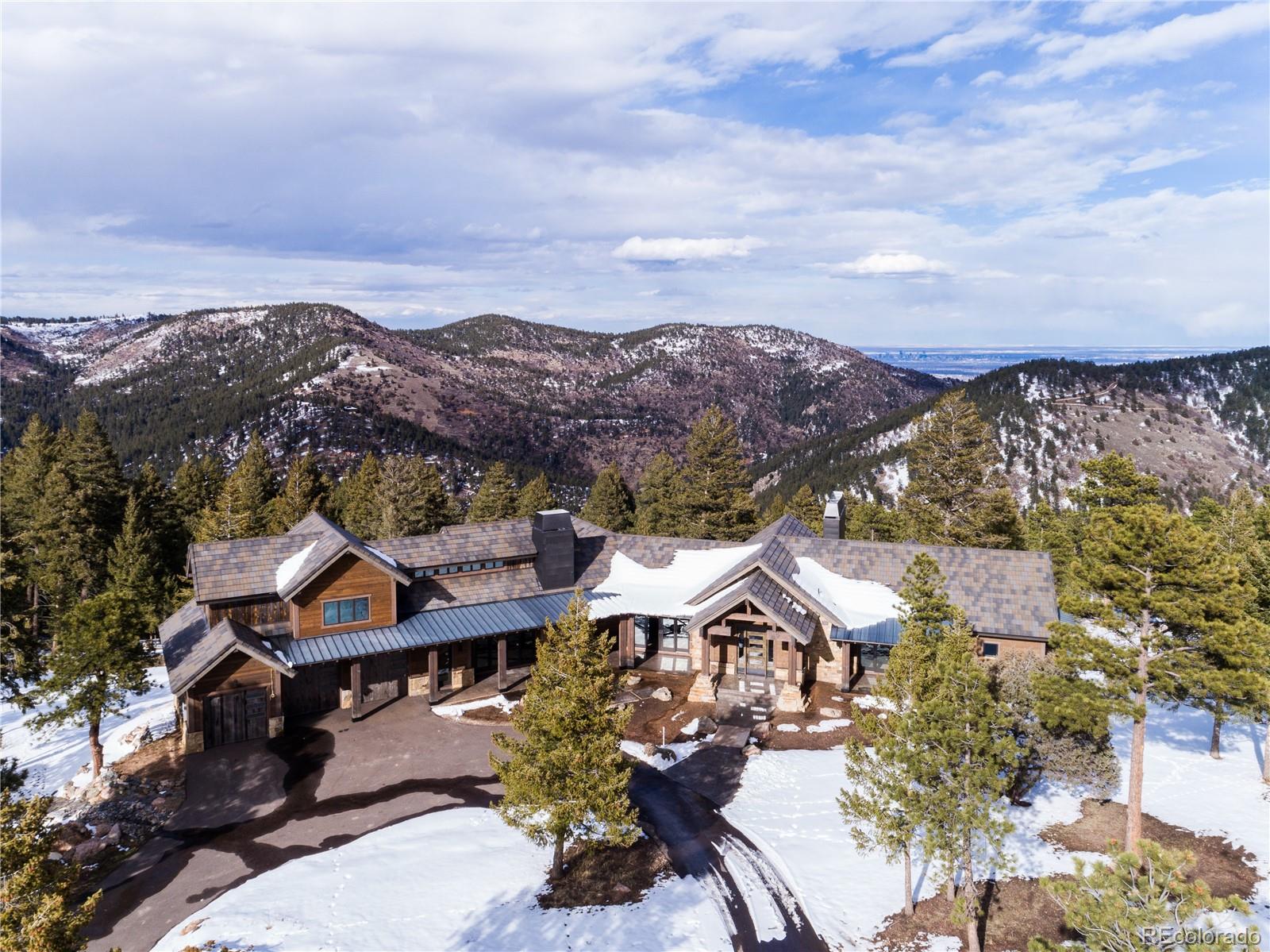 6135 Northway Drive Morrison, CO 80465 - Photo 2 of 40 an aerial view of residential houses and trees