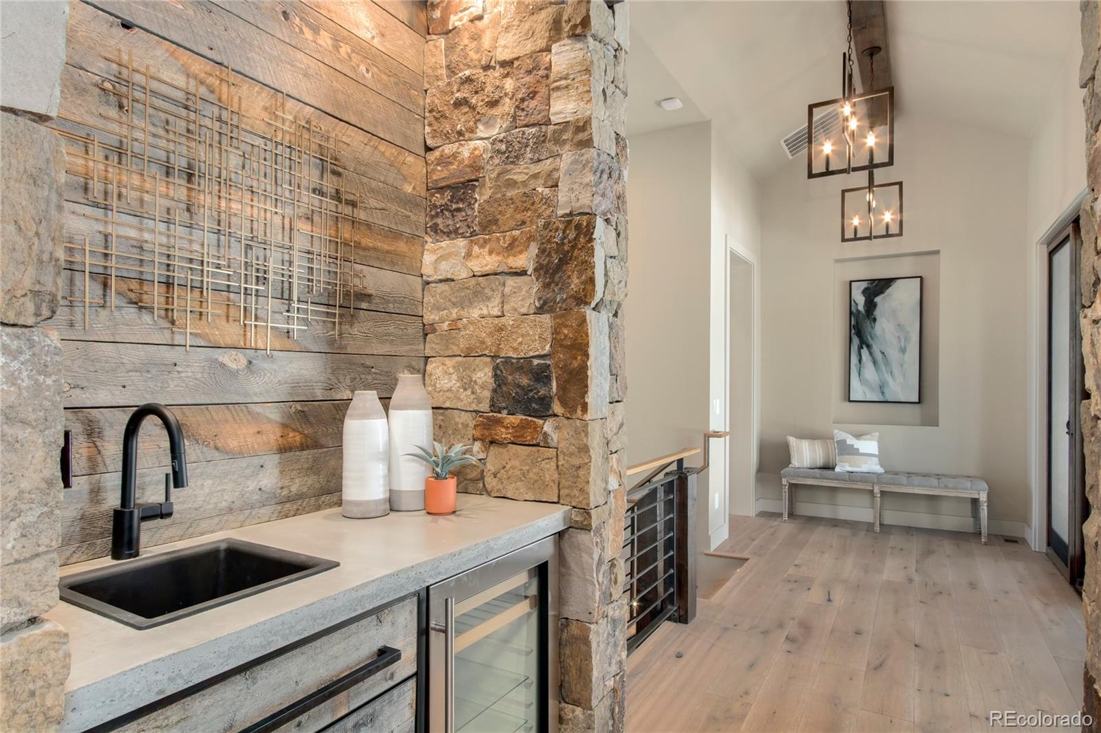 6135 Northway Drive Morrison, CO 80465 - Photo 22 of 40 a kitchen with a sink and a refrigerator