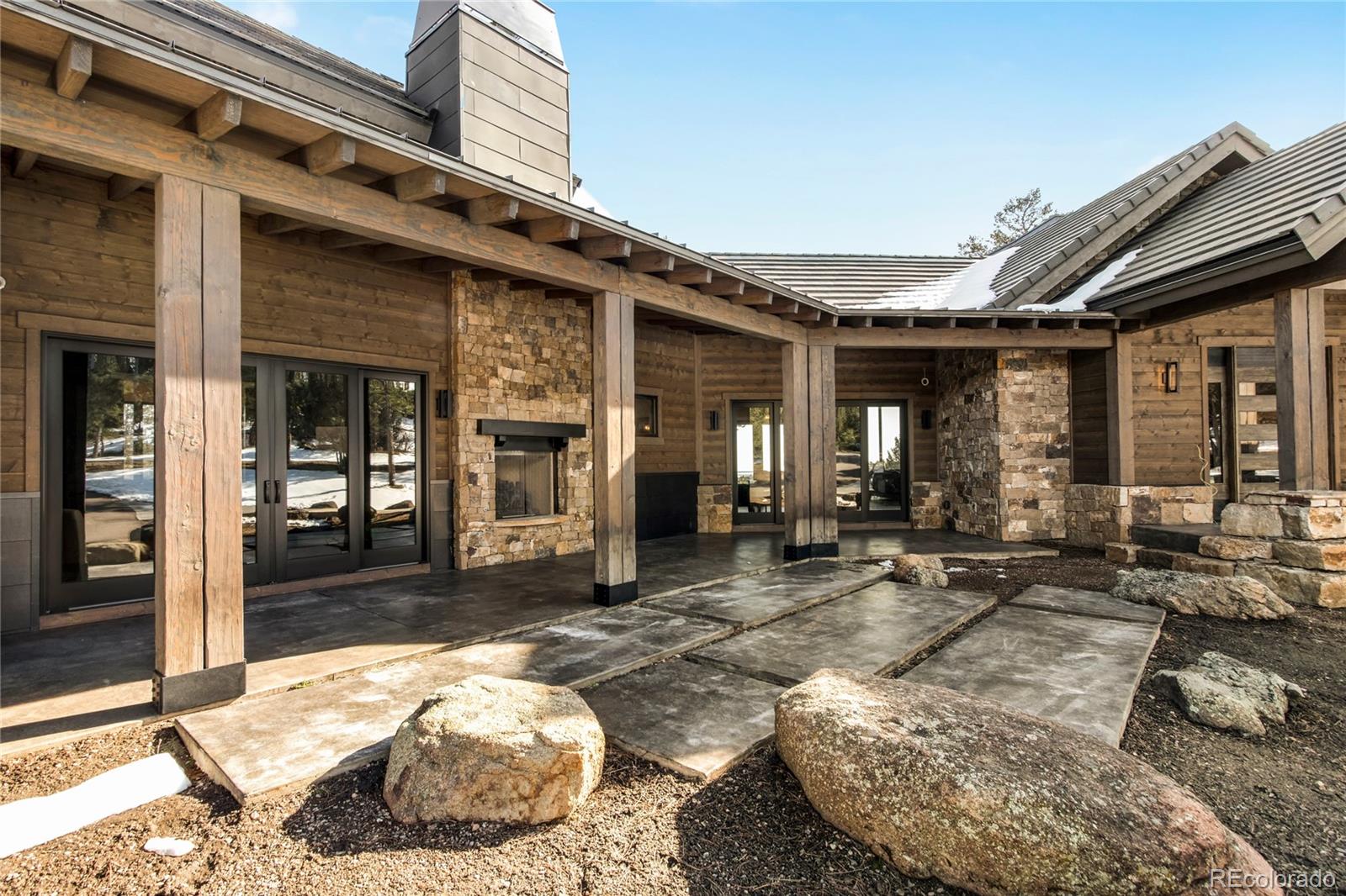 6135 Northway Drive Morrison, CO 80465 - Photo 7 of 40 a building exterior with seating space