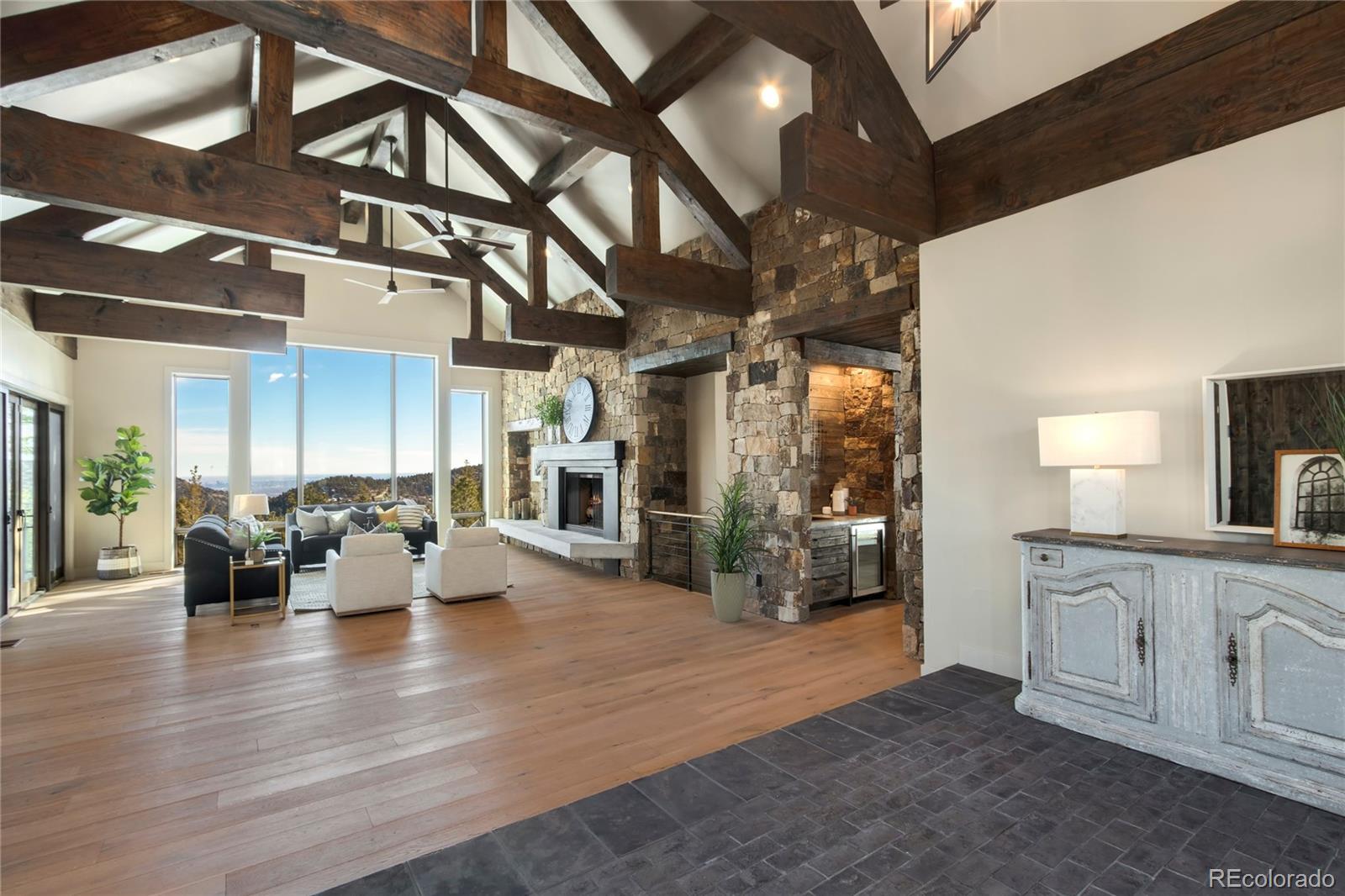 6135 Northway Drive Morrison, CO 80465 - Photo 9 of 40 a large living room with stainless steel appliances granite countertop lots of counter space