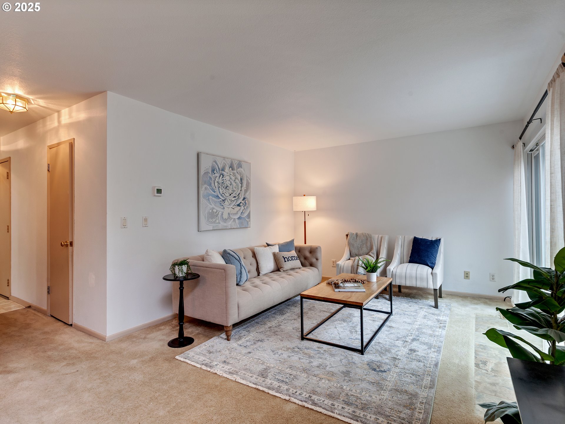 17822 Northwest Lakeway Court Beaverton, OR 97006 - Photo 13 of 45 a living room with furniture and a potted plant