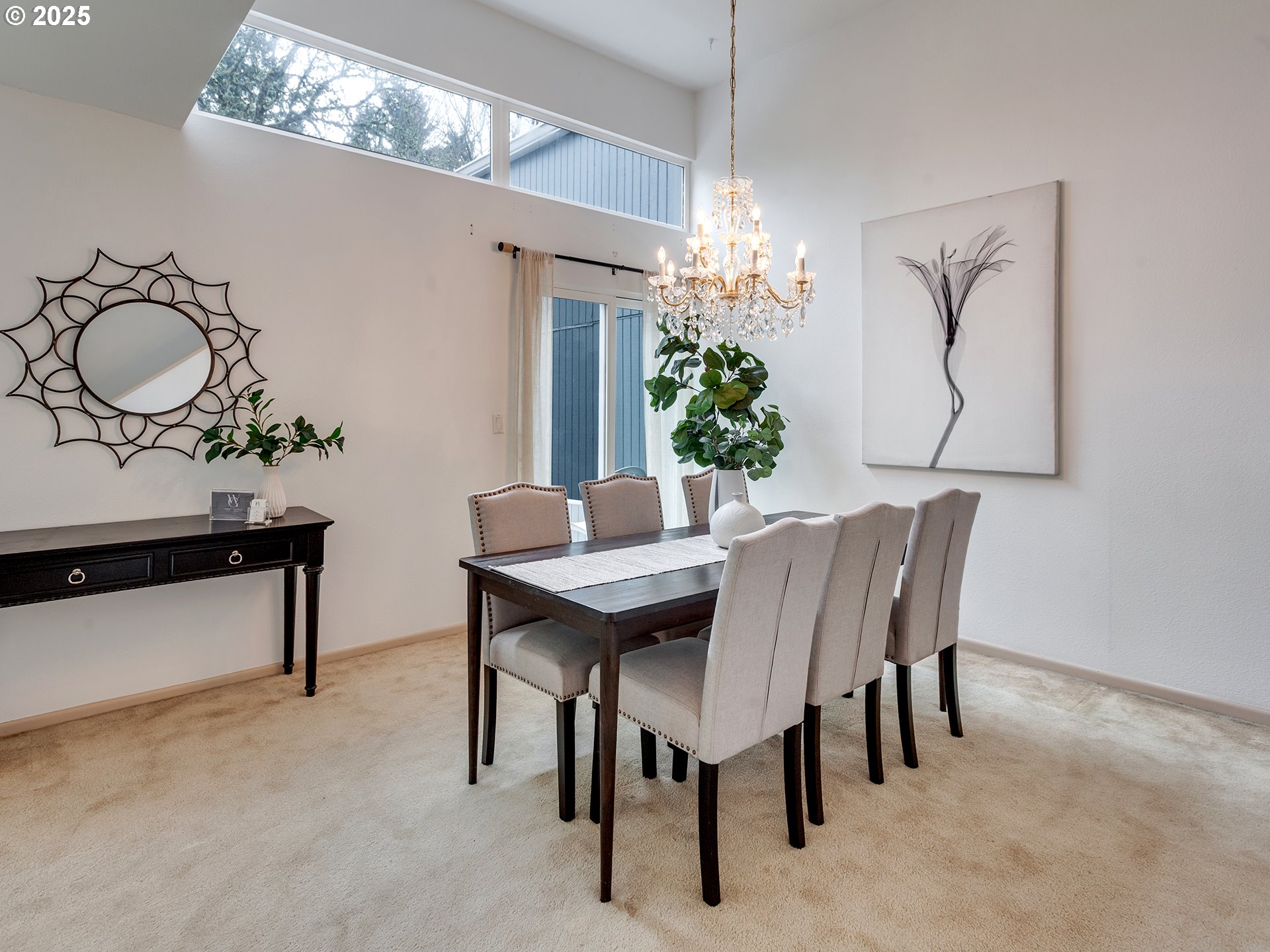 17822 Northwest Lakeway Court Beaverton, OR 97006 - Photo 15 of 45 a view of a dining room with furniture and chandelier