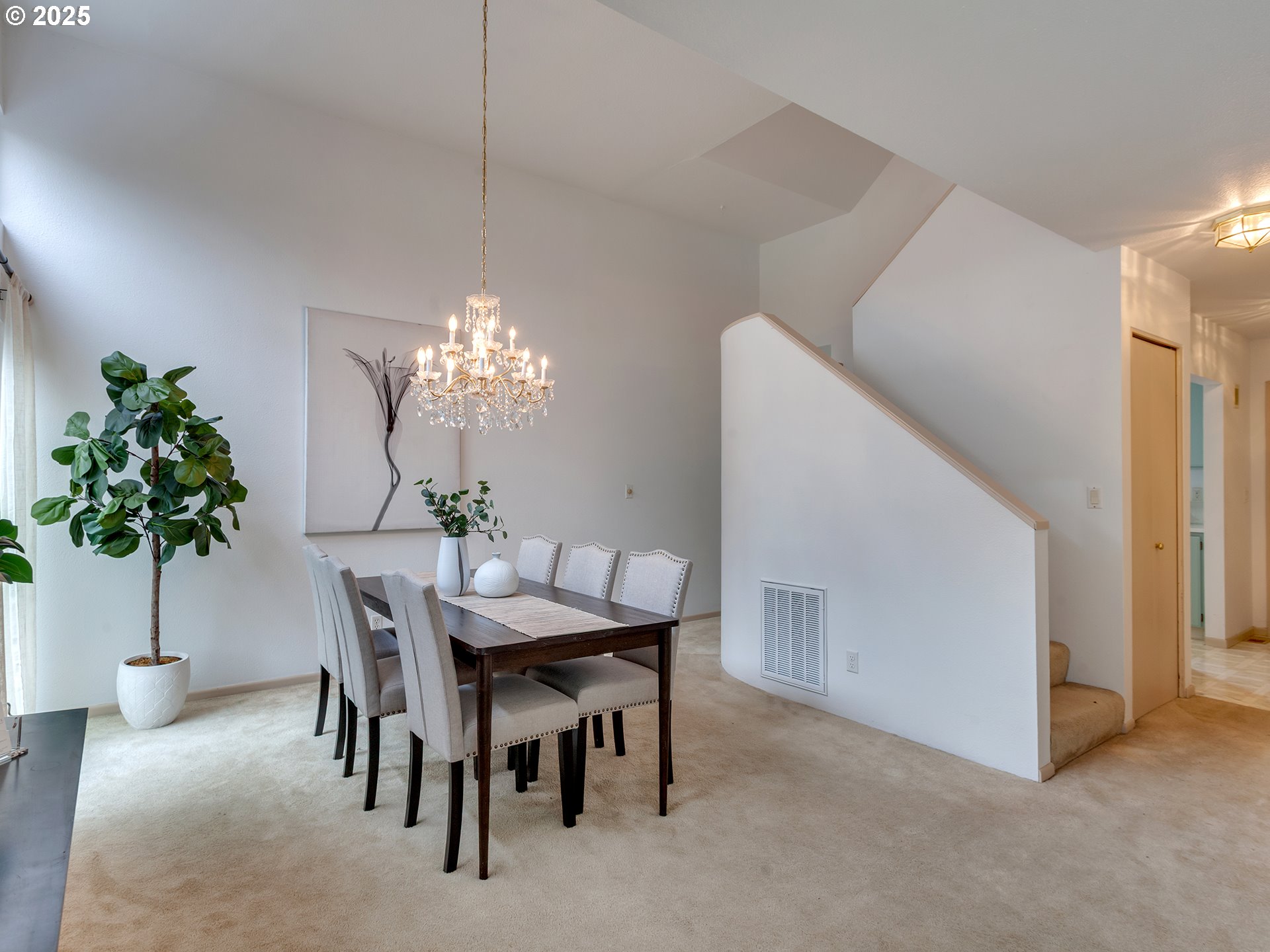 17822 Northwest Lakeway Court Beaverton, OR 97006 - Photo 18 of 45 a view of a dining room with furniture and chandelier