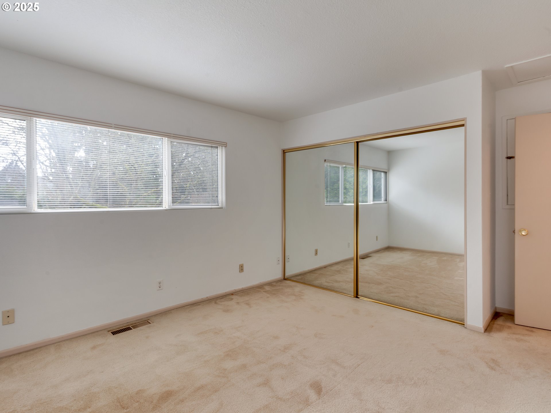 17822 Northwest Lakeway Court Beaverton, OR 97006 - Photo 25 of 45 a view of an empty room with a window