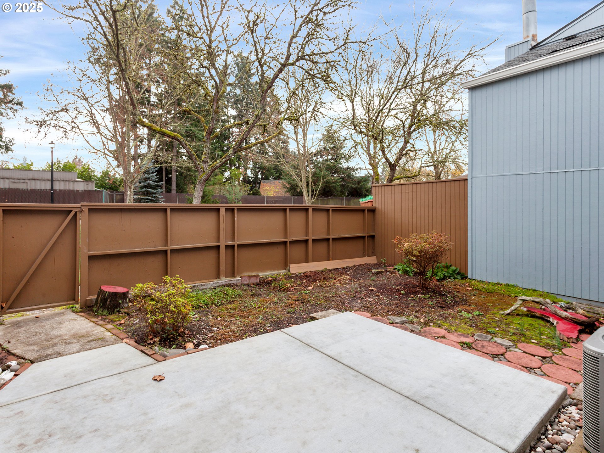 17822 Northwest Lakeway Court Beaverton, OR 97006 - Photo 5 of 45 a view of a backyard
