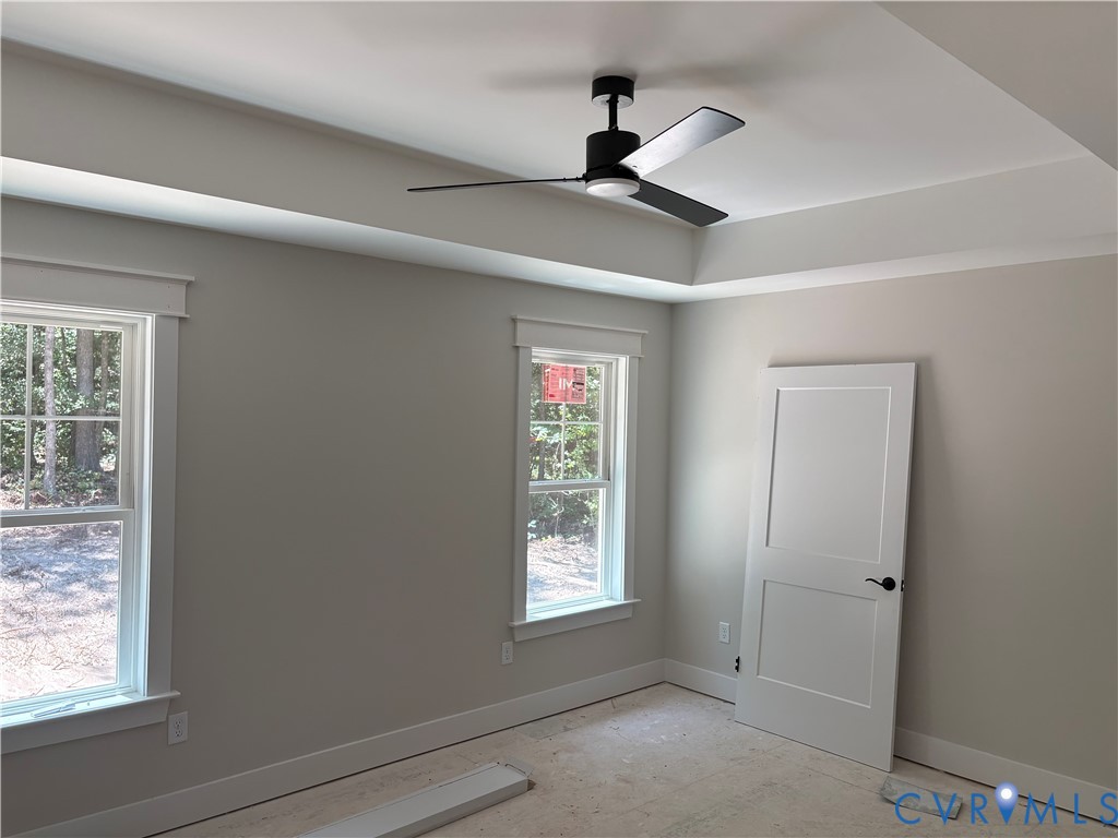 15135 Lebanon Road Spring Grove, VA 23881 - Photo 5 of 19 Tray ceiling with crown molding and a modern black