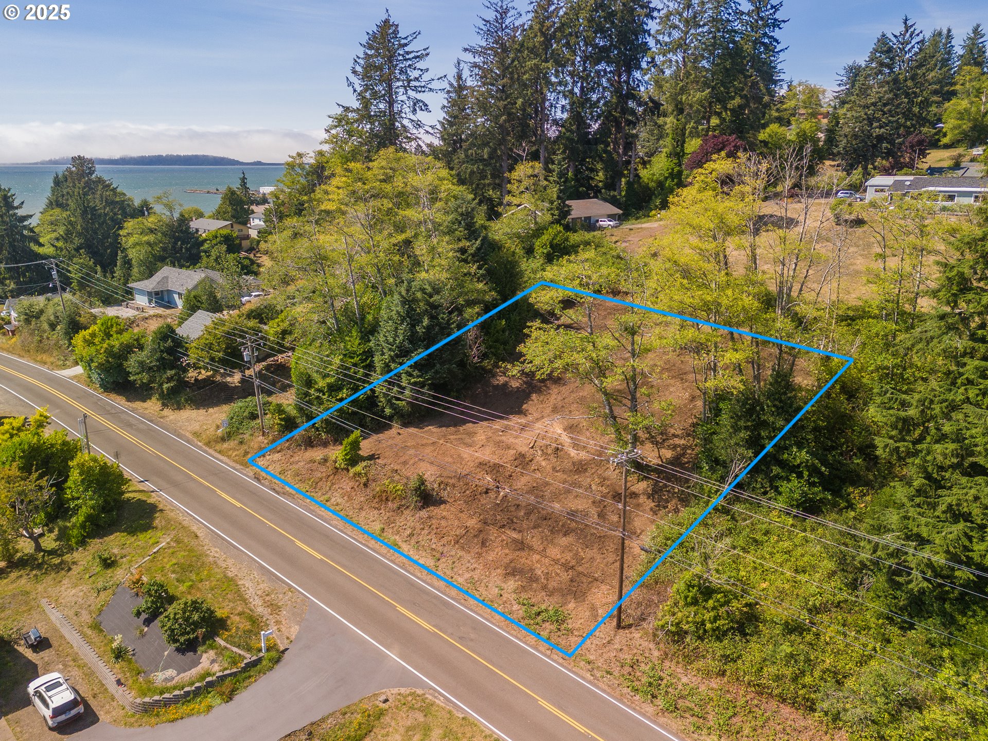 6230 Tillamook Avenue, Unit TL 5400 Bay City, OR 97107 - Photo 2 of 9 a view of a backyard