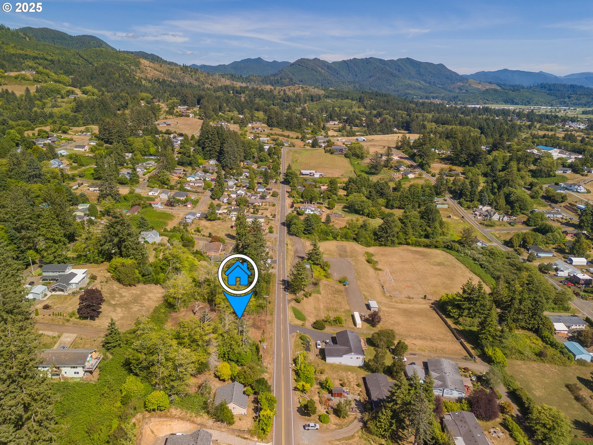 6230 Tillamook Avenue, Unit TL 5400 Bay City, OR 97107 - Photo 7 of 9 a view of a city with mountain