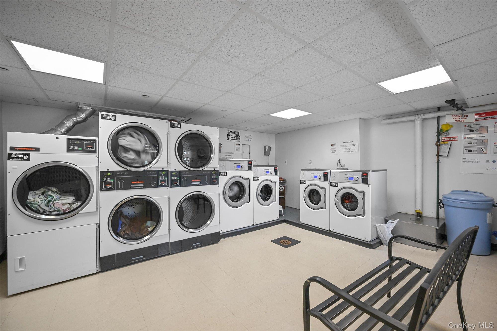 211-40 18th Avenue, Unit 4A Queens, NY 11360 - Photo 17 of 21 a utility room with dryer washer and dryer