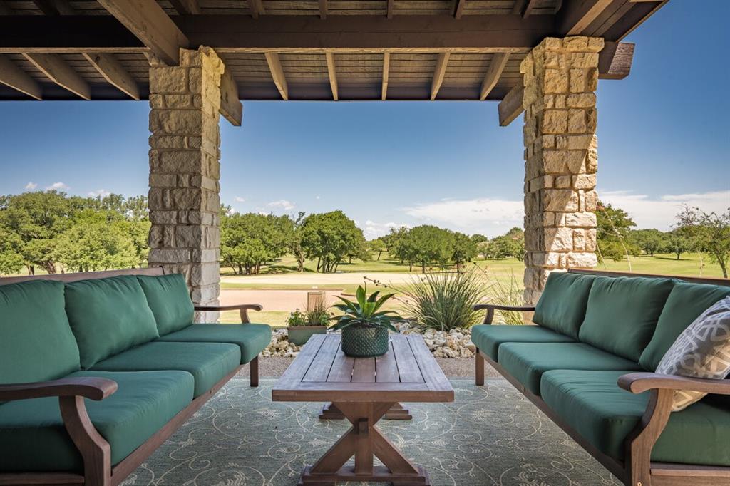 32016 Dove Trail Whitney, TX 76692 - Photo 13 of 21 a view of balcony with furniture and a potted plant