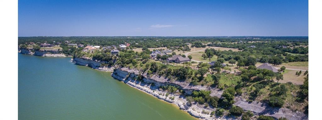 32016 Dove Trail Whitney, TX 76692 - Photo 3 of 21 an aerial view of a house with a lake view
