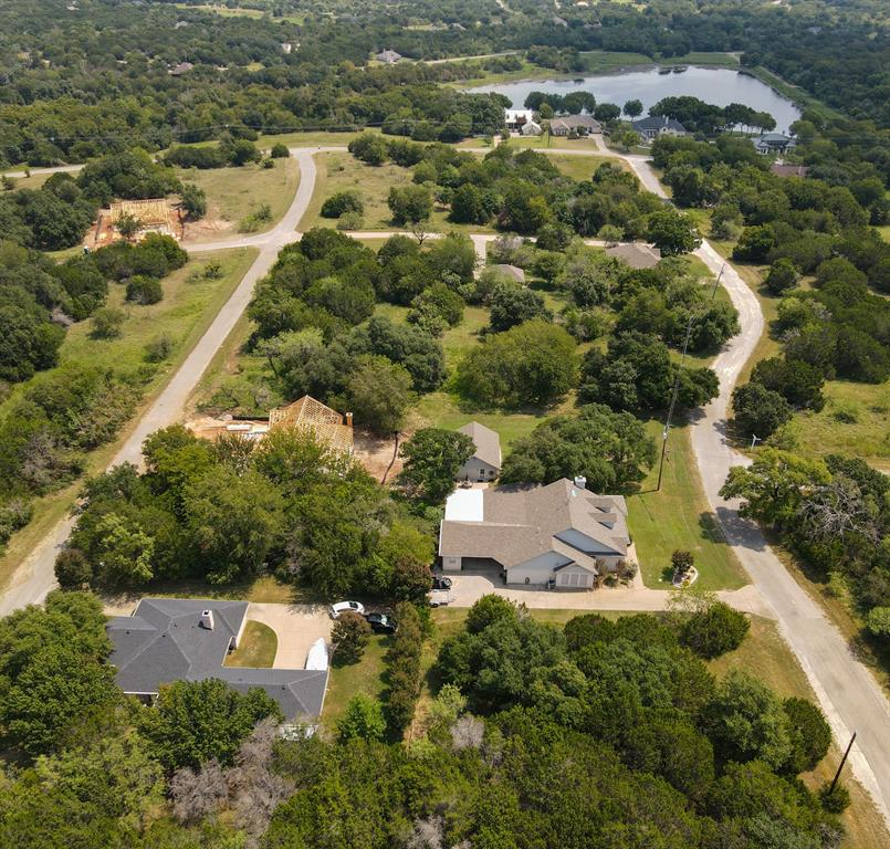 32016 Dove Trail Whitney, TX 76692 - Photo 9 of 21 an aerial view of residential houses with outdoor space