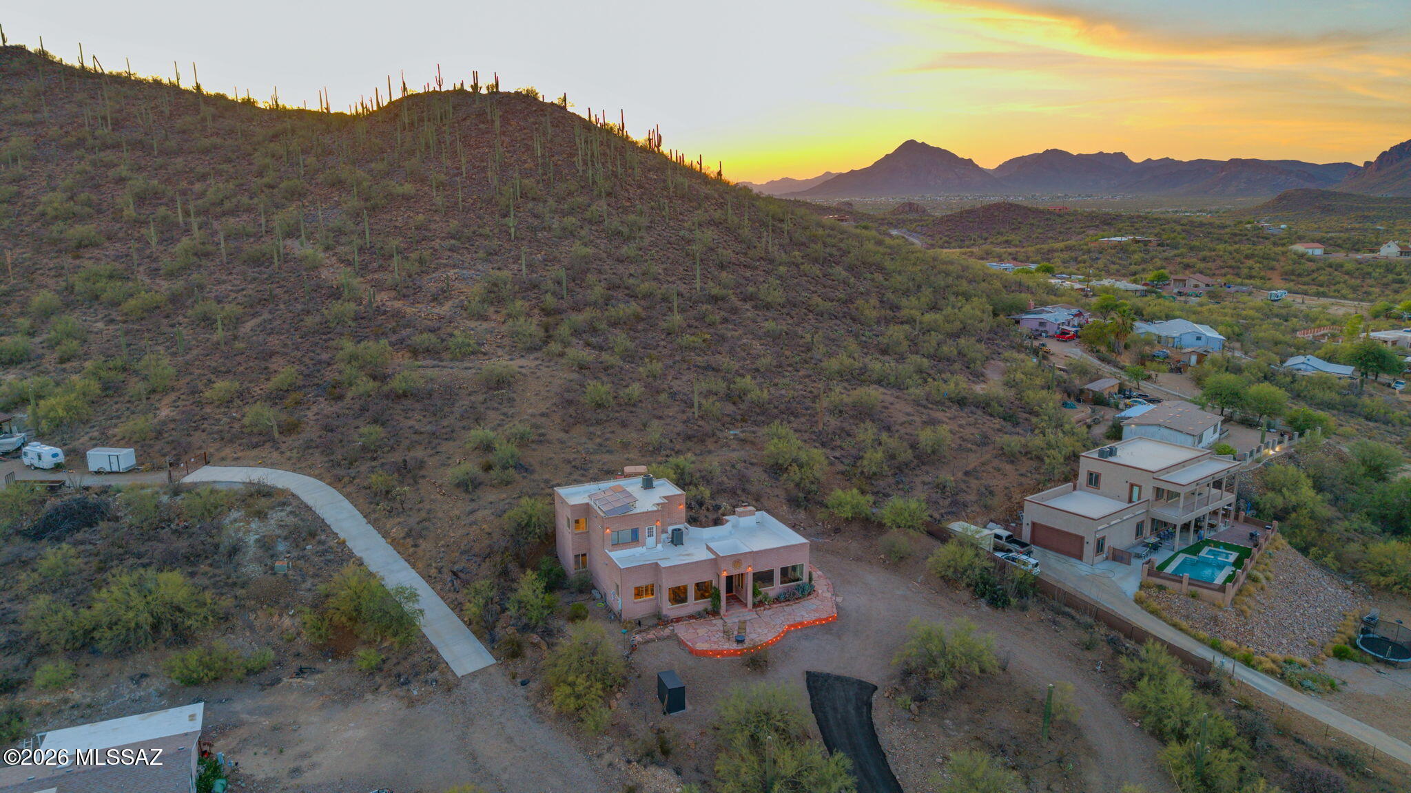 4210 West Mossman Road Tucson, AZ 85746 - Photo 47 of 51 an aerial view of a house with mountain view