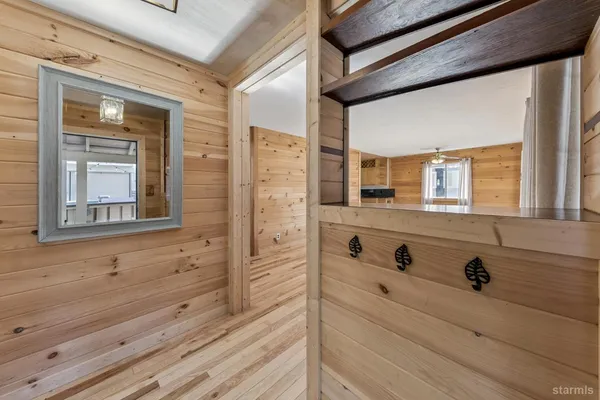 a view of two dresser and a mirror