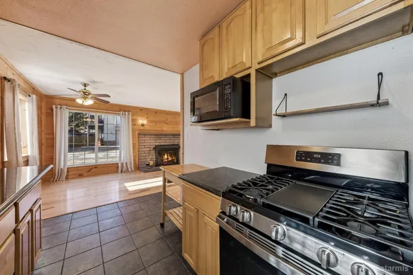 a kitchen with a stove and a sink